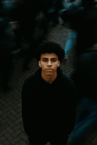 Standing Alone in Crowd